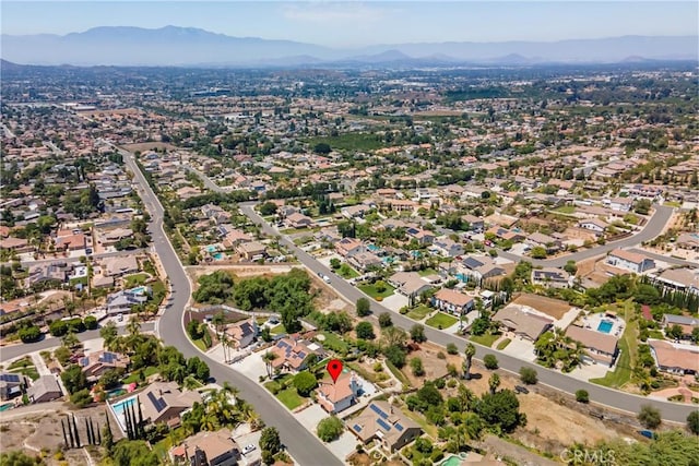 2151 Lyon Ave, Riverside, CA 92503 - aerial overview of property's location featuring mountains and nearby suburban area