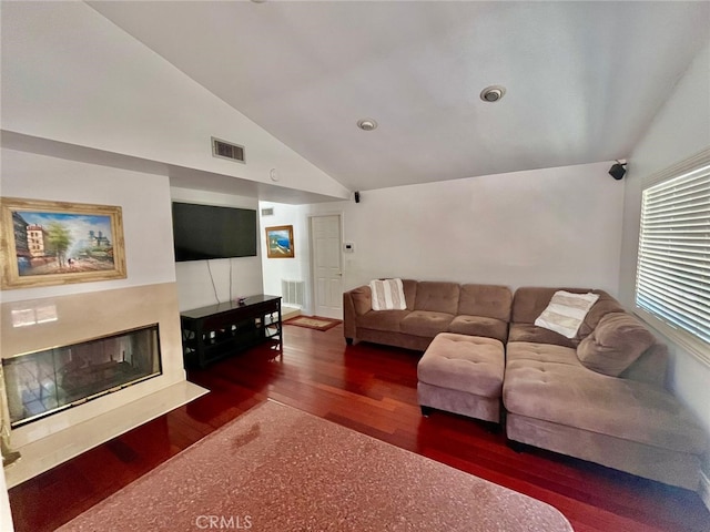 10116 Viking Ave, Northridge, CA 91324 - living area featuring vaulted ceiling, wood finished floors, and a fireplace with flush hearth