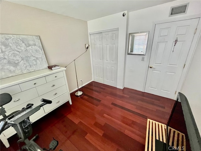 10116 Viking Ave, Northridge, CA 91324 - unfurnished bedroom with dark wood finished floors and a closet