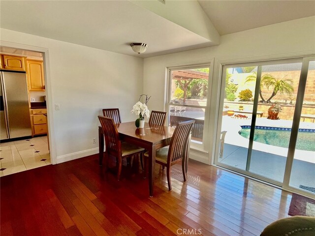 10116 Viking Ave, Northridge, CA 91324 - dining room featuring light wood finished floors