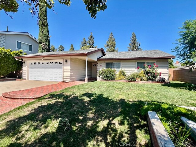 10116 Viking Ave, Northridge, CA 91324 - ranch-style home featuring a garage and driveway