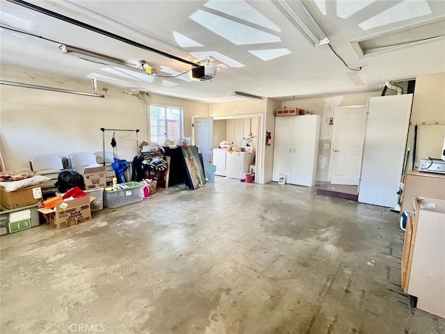 10116 Viking Ave, Northridge, CA 91324 - garage featuring a garage door opener and washer / dryer