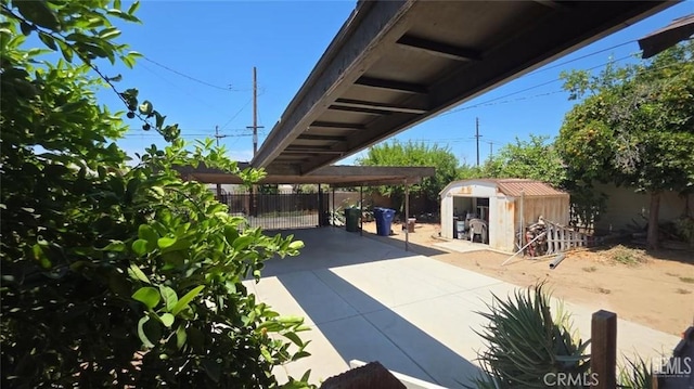 625 Cedar Ave, Wasco, CA 93280 - view of patio / terrace with a storage shed