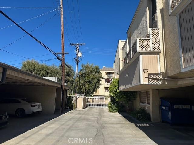 4807 Beck Ave Unit 4, Valley Village, CA 91601 - view of concrete driveway with a gate