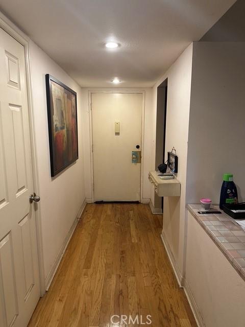 4807 Beck Ave Unit 4, Valley Village, CA 91601 - hallway featuring light wood finished floors and recessed lighting