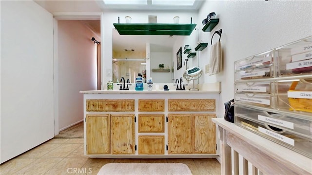 15233 Olive St, Hesperia, CA 92345 - bathroom featuring a stall shower, vanity, and tile patterned flooring