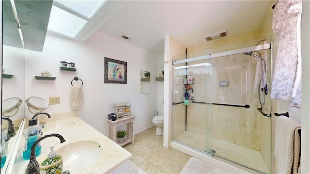 15233 Olive St, Hesperia, CA 92345 - bathroom with a skylight, double vanity, and a stall shower