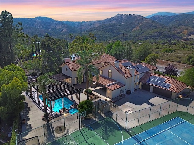 462 Pomello Dr, Claremont, CA 91711 - aerial view at dusk of a mountain view