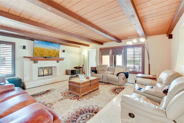 462 Pomello Dr, Claremont, CA 91711 - tiled living area featuring a wooden ceiling with exposed beams and a warm lit fireplace