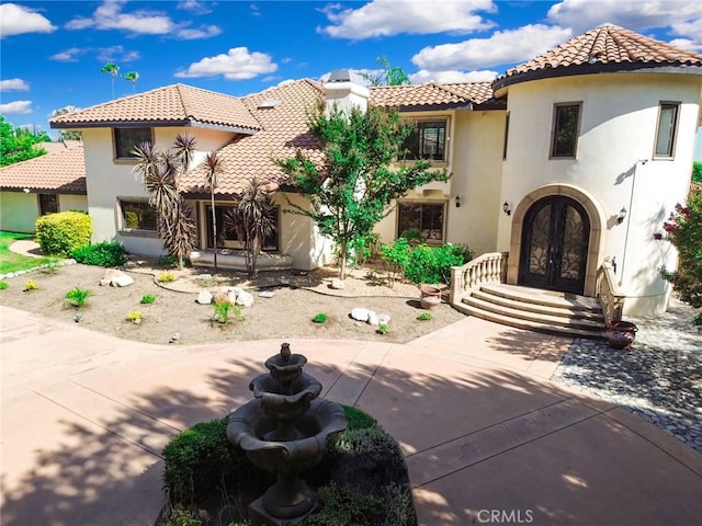 462 Pomello Dr, Claremont, CA 91711 - mediterranean / spanish house with french doors, a tiled roof, and stucco siding