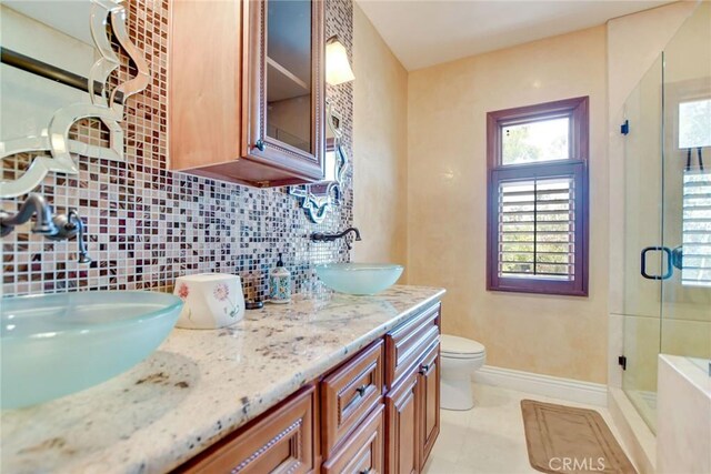 462 Pomello Dr, Claremont, CA 91711 - bathroom with a stall shower, backsplash, and plenty of natural light
