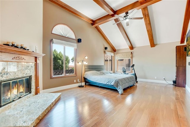 462 Pomello Dr, Claremont, CA 91711 - bedroom featuring high vaulted ceiling, a premium fireplace, beamed ceiling, and wood finished floors