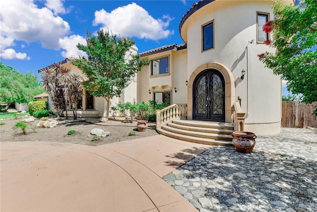 462 Pomello Dr, Claremont, CA 91711 - view of exterior entry with stucco siding and a tile roof