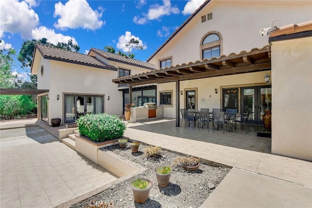 462 Pomello Dr, Claremont, CA 91711 - back of property featuring stucco siding, a patio area, french doors, and area for grilling