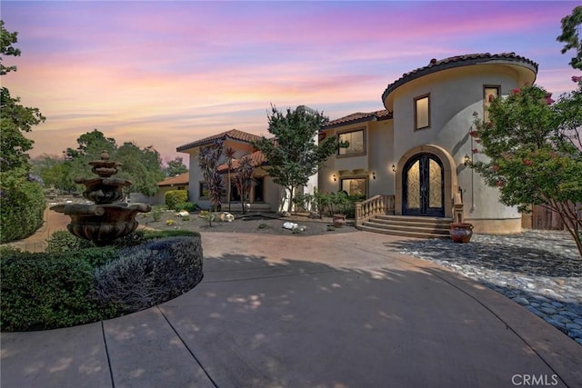 462 Pomello Dr, Claremont, CA 91711 - mediterranean / spanish house with french doors, stucco siding, and a tiled roof