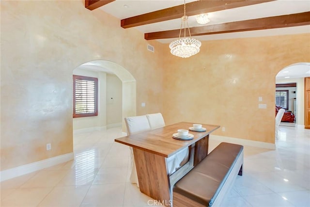462 Pomello Dr, Claremont, CA 91711 - dining room with arched walkways, light tile patterned floors, beamed ceiling, and a chandelier