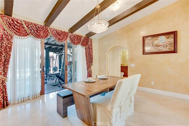 462 Pomello Dr, Claremont, CA 91711 - dining space with arched walkways, beam ceiling, a chandelier, and light tile patterned floors