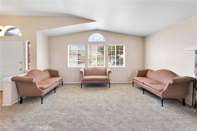 26969 Lakeview Dr, Helendale, CA 92342 - carpeted living area with lofted ceiling and baseboards