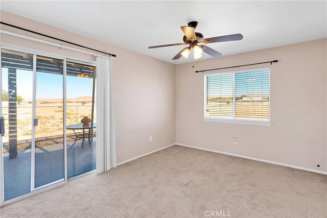 26969 Lakeview Dr, Helendale, CA 92342 - carpeted empty room featuring a ceiling fan and baseboards