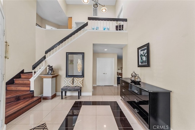 40236 Holden Cir, Temecula, CA 92591 - tiled foyer with stairs and a towering ceiling