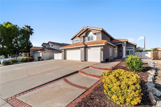40236 Holden Cir, Temecula, CA 92591 - view of front of house featuring concrete driveway, a garage, stucco siding, and a tile roof