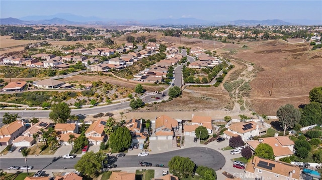 40236 Holden Cir, Temecula, CA 92591 - aerial overview of property's location featuring nearby suburban area and a mountainous background