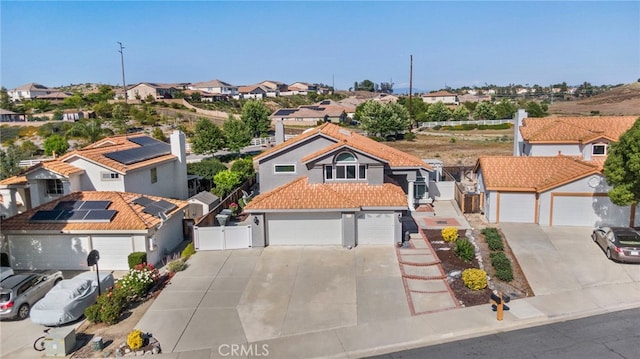 40236 Holden Cir, Temecula, CA 92591 - view of front of property with a residential view, driveway, a gate, a garage, and a tile roof