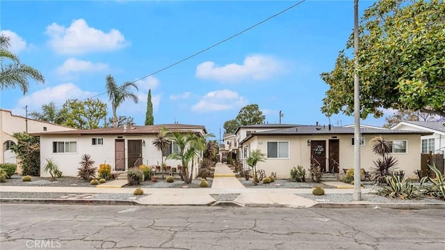 817 Mira Mar Ave, Long Beach, CA 90804 - view of front of property featuring stucco siding and entry steps