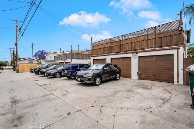 817 Mira Mar Ave, Long Beach, CA 90804 - view of parking featuring a garage and concrete driveway