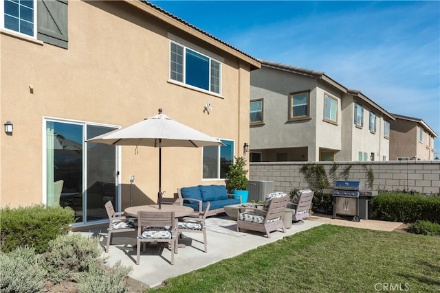 11829 Confluence Dr, Jurupa Valley, CA 91752 - rear view of house featuring an outdoor living space, a patio area, and stucco siding