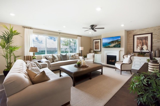 11829 Confluence Dr, Jurupa Valley, CA 91752 - living area featuring a ceiling fan, a warm lit fireplace, and recessed lighting