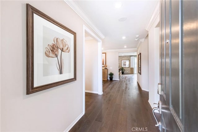 11829 Confluence Dr, Jurupa Valley, CA 91752 - corridor featuring crown molding, dark wood-type flooring, and recessed lighting