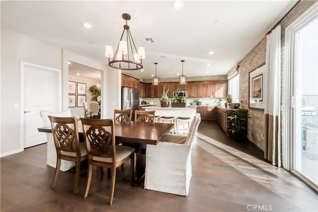 11829 Confluence Dr, Jurupa Valley, CA 91752 - dining room featuring recessed lighting, a chandelier, and wood finished floors