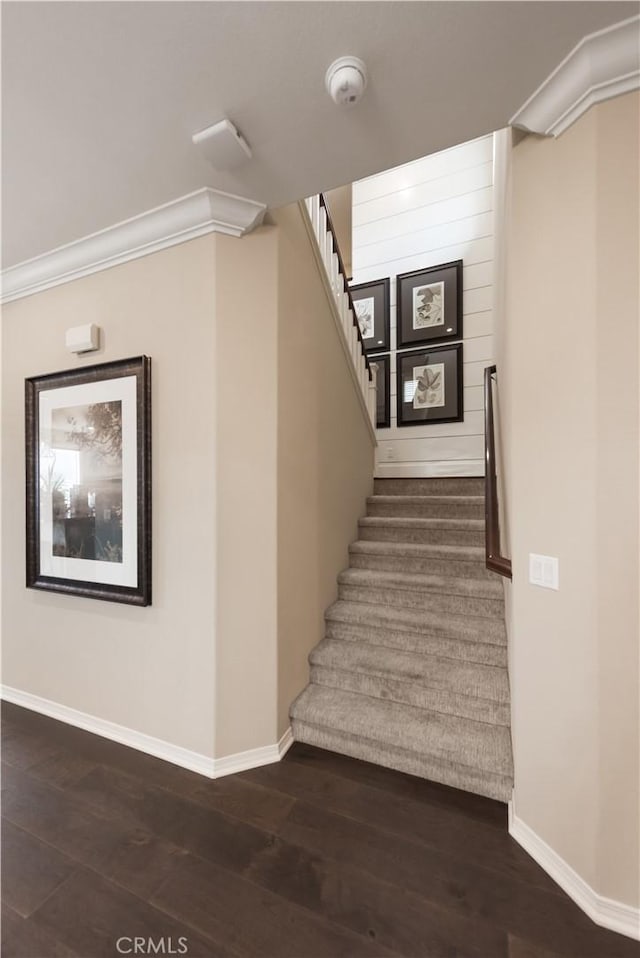 11829 Confluence Dr, Jurupa Valley, CA 91752 - stairway featuring baseboards and wood finished floors