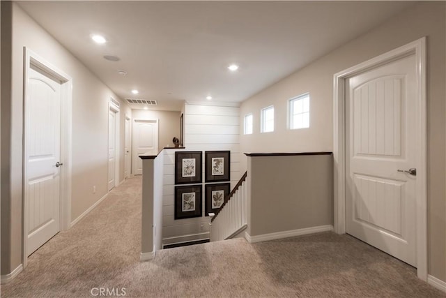 11829 Confluence Dr, Jurupa Valley, CA 91752 - hall featuring an upstairs landing, carpet, and recessed lighting