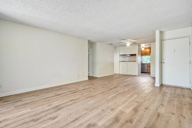 6180 Agee St Unit 159, University City, CA 92122 - unfurnished living room featuring light wood-style floors, a textured ceiling, and ceiling fan