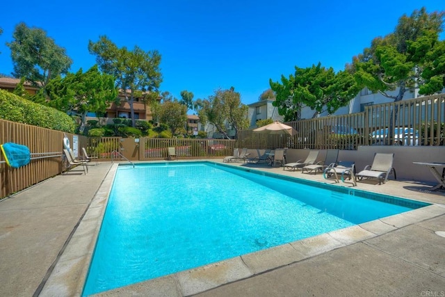 6180 Agee St Unit 159, University City, CA 92122 - community pool featuring a patio and a residential view