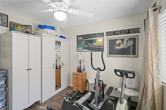 44505 Shadowcrest Dr, Lancaster, CA 93536 - exercise area with dark wood-style flooring and a ceiling fan