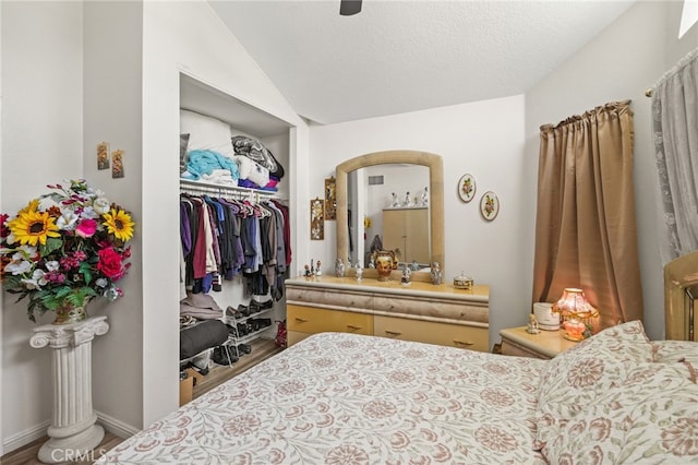 44505 Shadowcrest Dr, Lancaster, CA 93536 - bedroom with wood finished floors, a closet, lofted ceiling, and a ceiling fan