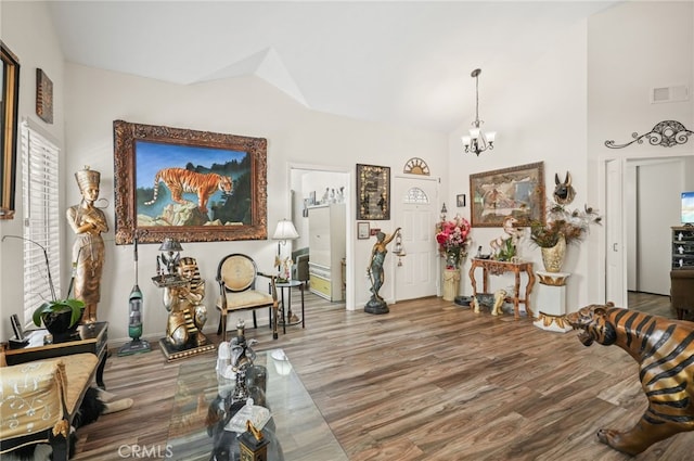 44505 Shadowcrest Dr, Lancaster, CA 93536 - living area featuring a chandelier and wood finished floors