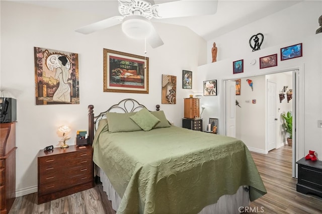 44505 Shadowcrest Dr, Lancaster, CA 93536 - bedroom with wood finished floors, lofted ceiling, and a ceiling fan