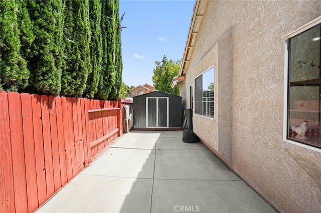 44505 Shadowcrest Dr, Lancaster, CA 93536 - view of patio / terrace with a shed