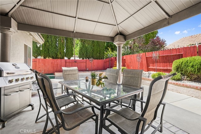 44505 Shadowcrest Dr, Lancaster, CA 93536 - fenced backyard featuring outdoor dining space, a patio area, and grilling area