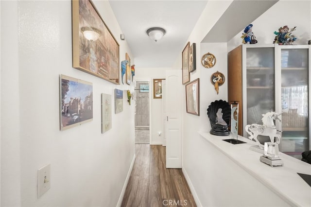44505 Shadowcrest Dr, Lancaster, CA 93536 - hallway featuring wood finished floors and baseboards