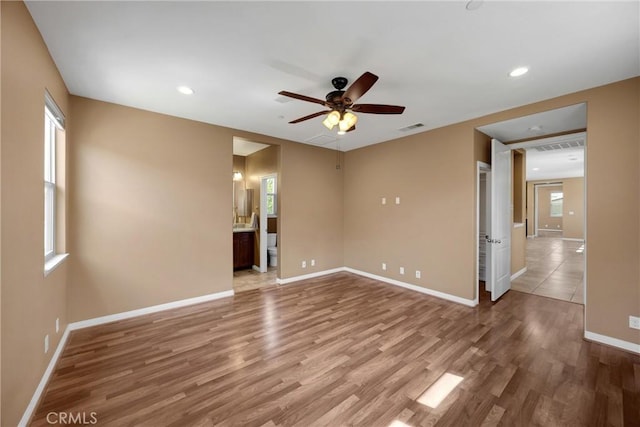 403 Sevilla Dr, Brea, CA 92823 - spare room with plenty of natural light, wood finished floors, a ceiling fan, and recessed lighting