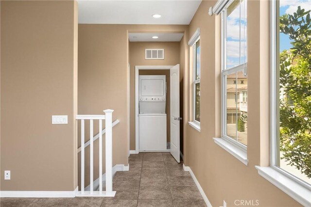403 Sevilla Dr, Brea, CA 92823 - hall featuring stacked washer / dryer, an upstairs landing, recessed lighting, and tile patterned floors