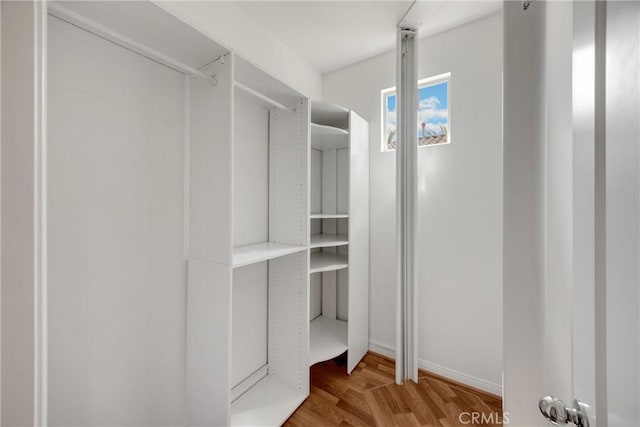403 Sevilla Dr, Brea, CA 92823 - walk in closet with wood finished floors