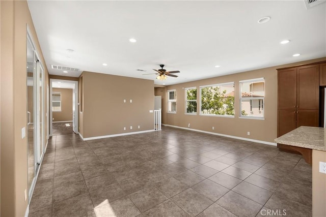 403 Sevilla Dr, Brea, CA 92823 - unfurnished living room with a ceiling fan, recessed lighting, and dark tile patterned flooring