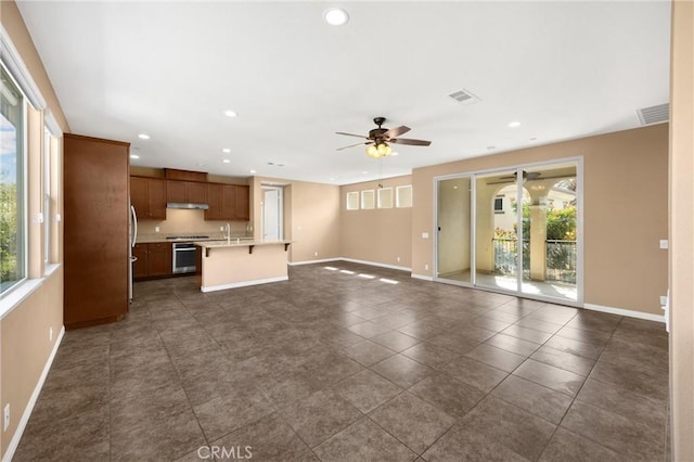 403 Sevilla Dr, Brea, CA 92823 - unfurnished living room with plenty of natural light, ceiling fan, and recessed lighting