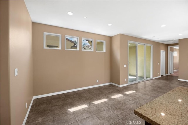 403 Sevilla Dr, Brea, CA 92823 - empty room with recessed lighting and dark tile patterned floors